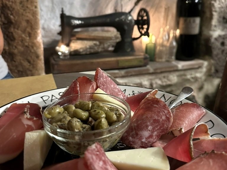 Tuscan cured meats, local cheese and olives served in Sorano
