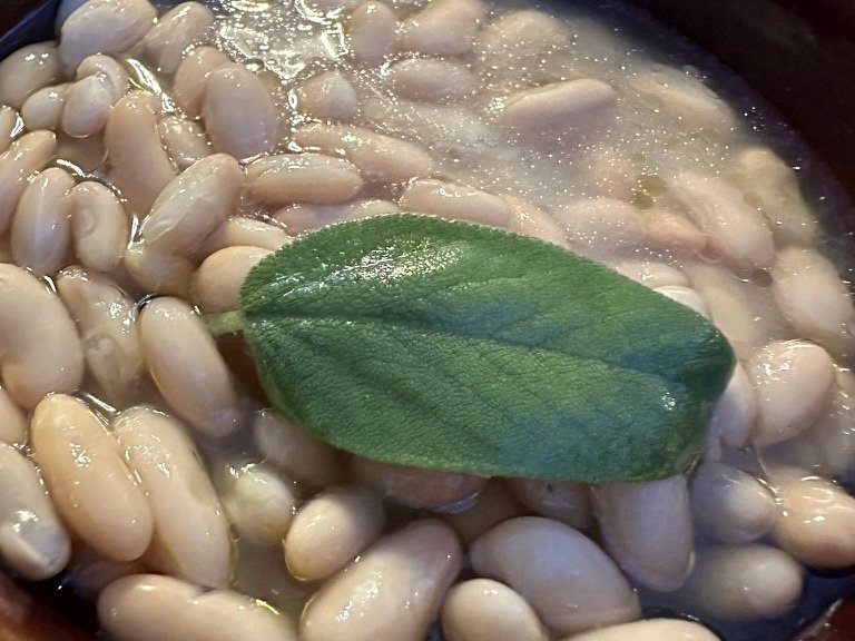 Tuscan white beans with sage served at a restaurant in Sorano